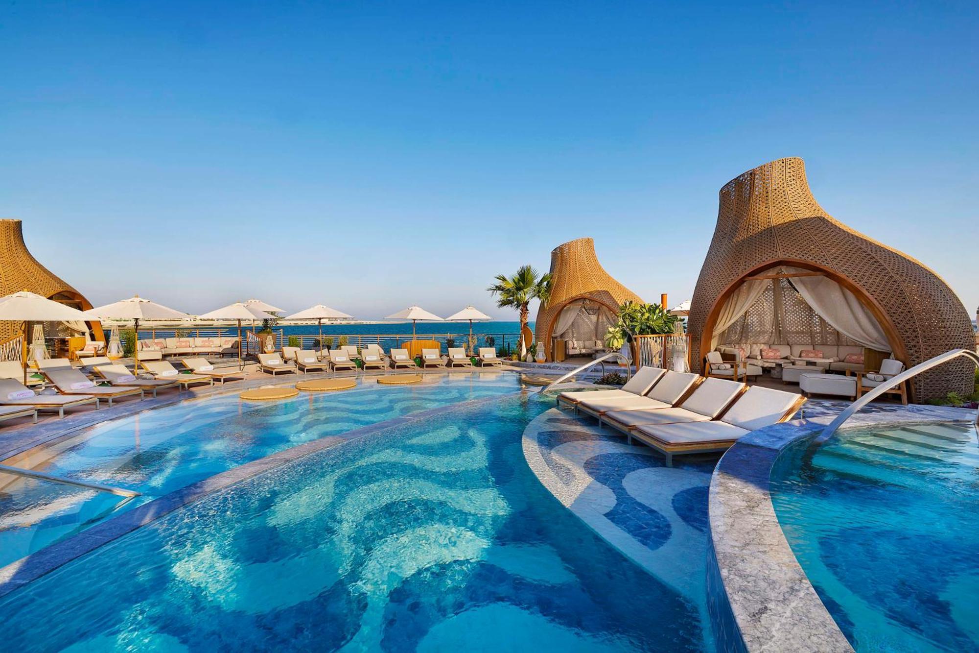 Waldorf Astoria Doha Lusail Exterior photo The resort's pool